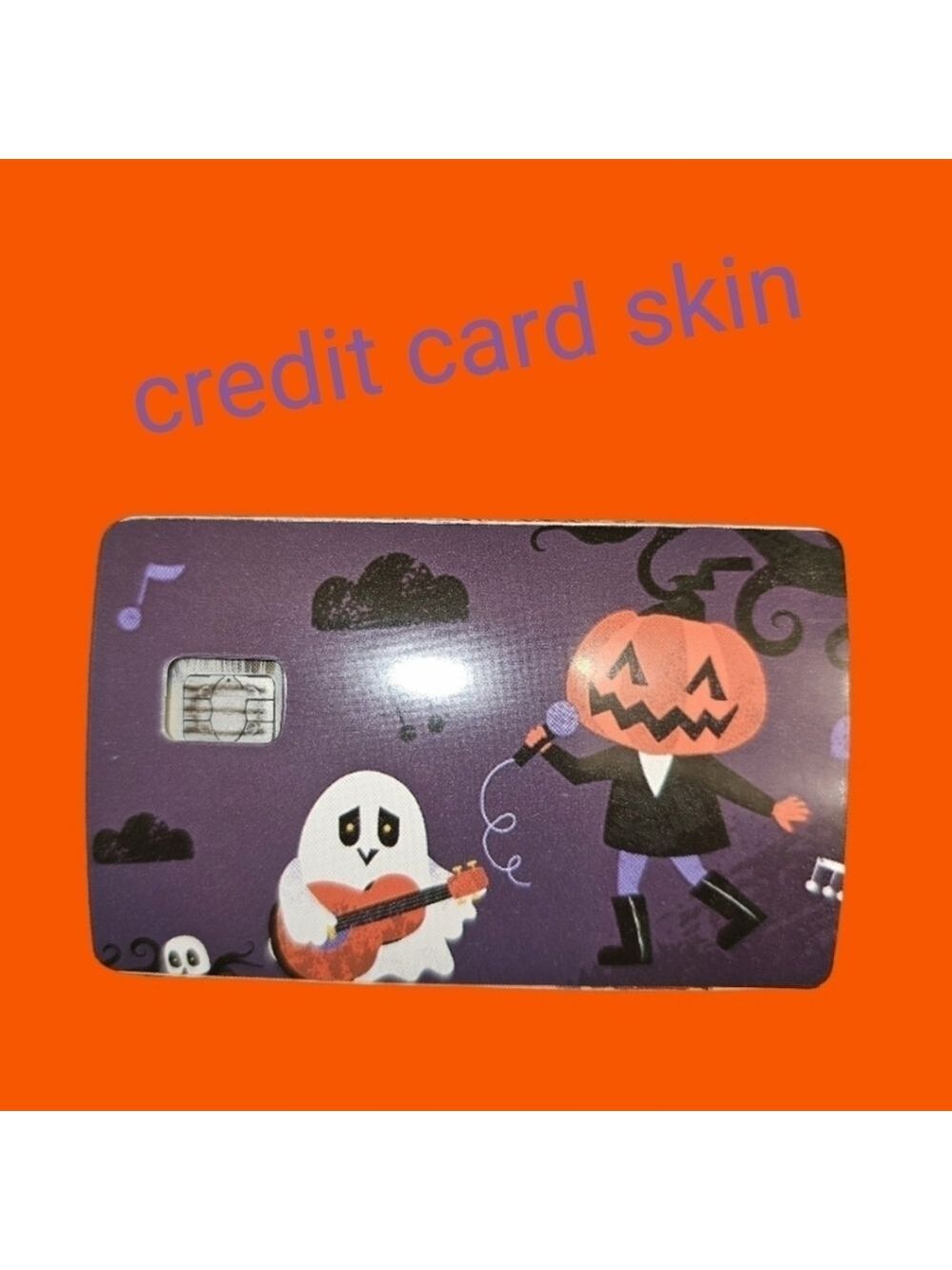 Pumpkin dancing & ghost playing guitar credit card skin for small chip cards